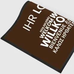 Fussmatte Willkommen braun mehrsprachig mit Logo, 80x120cm