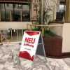 Kundenstopper GNE300 für Neu-Eröffnungen mit Plakat & Logo